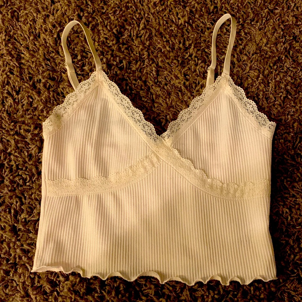 Cream colored tank top with lace design